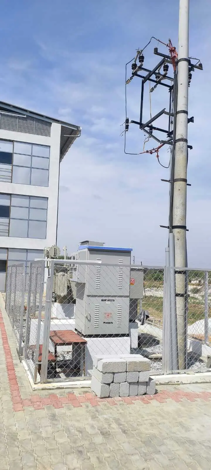 Utility pole with vertical panel mounting